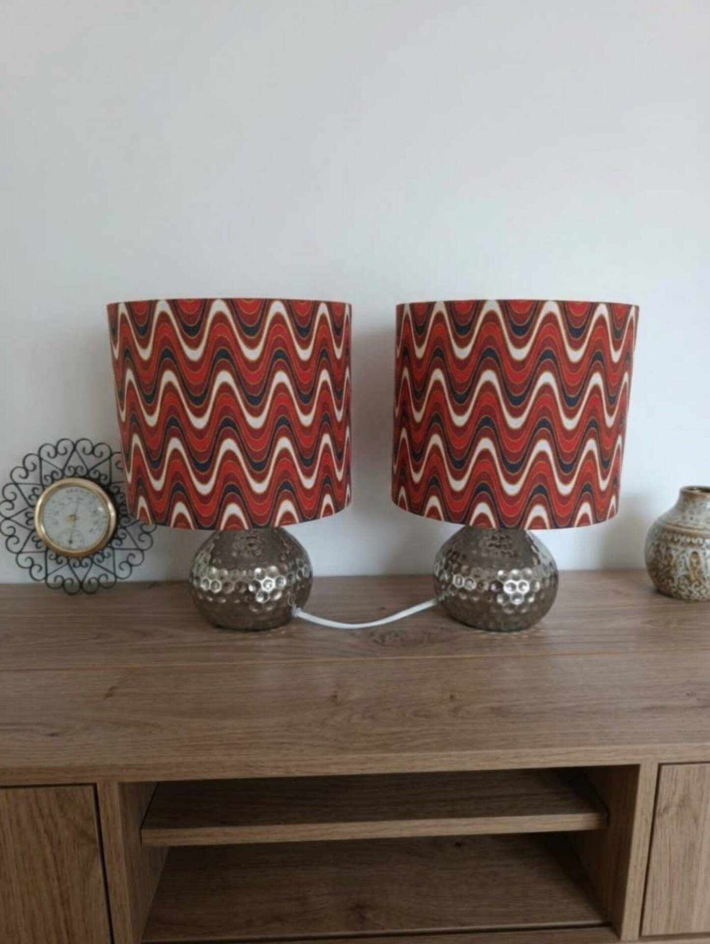 Vintage table lamp with printed shade featuring seventies waves.