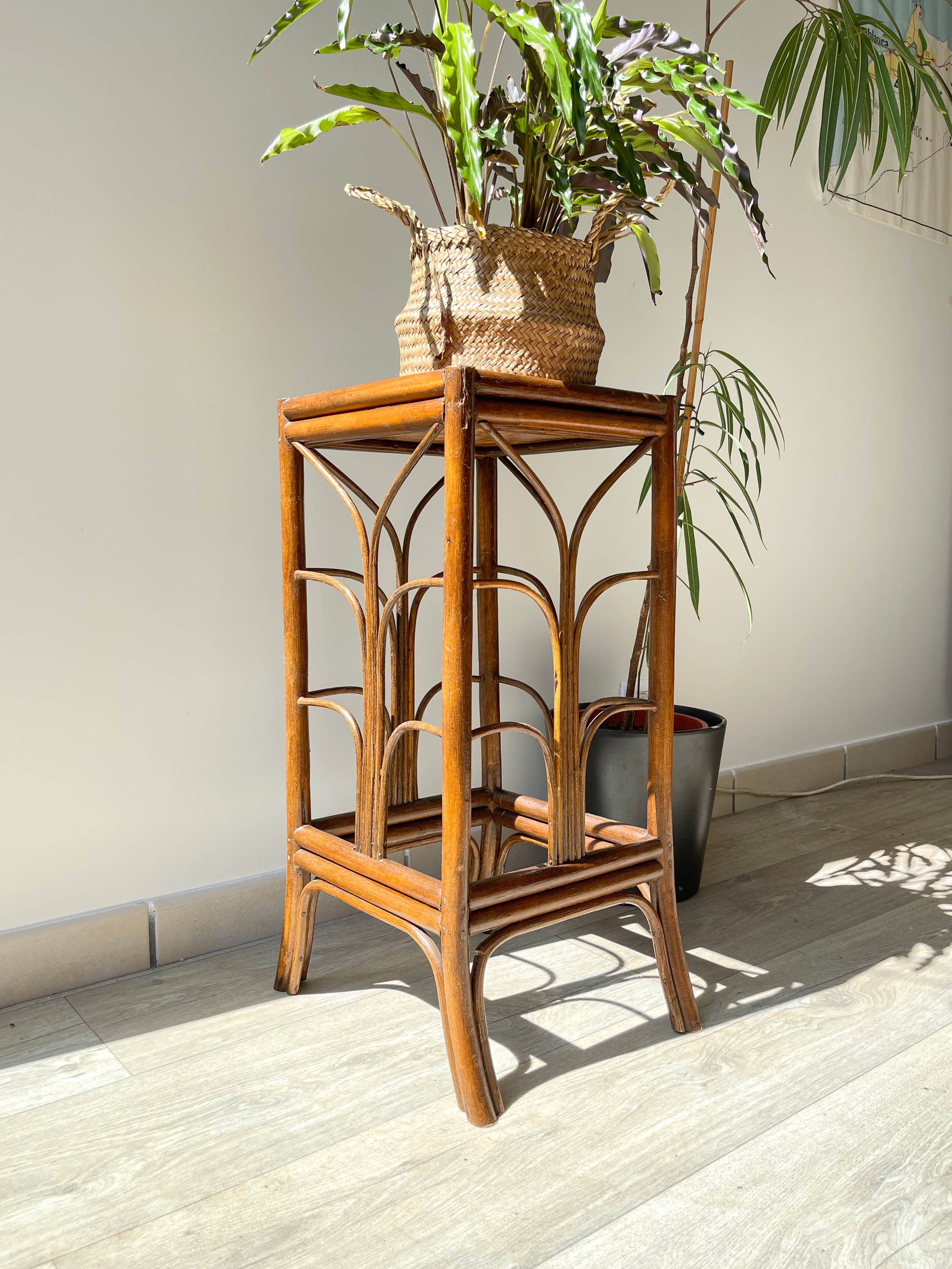 Vintage rattan plant stand in Art Deco style