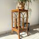 Vintage rattan plant stand in Art Deco style