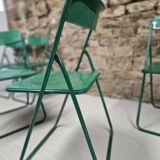 Set of 6 green folding patio chairs