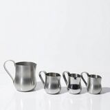 Set of 4 vintage bar measures in brushed stainless steel from the 60s-70s.