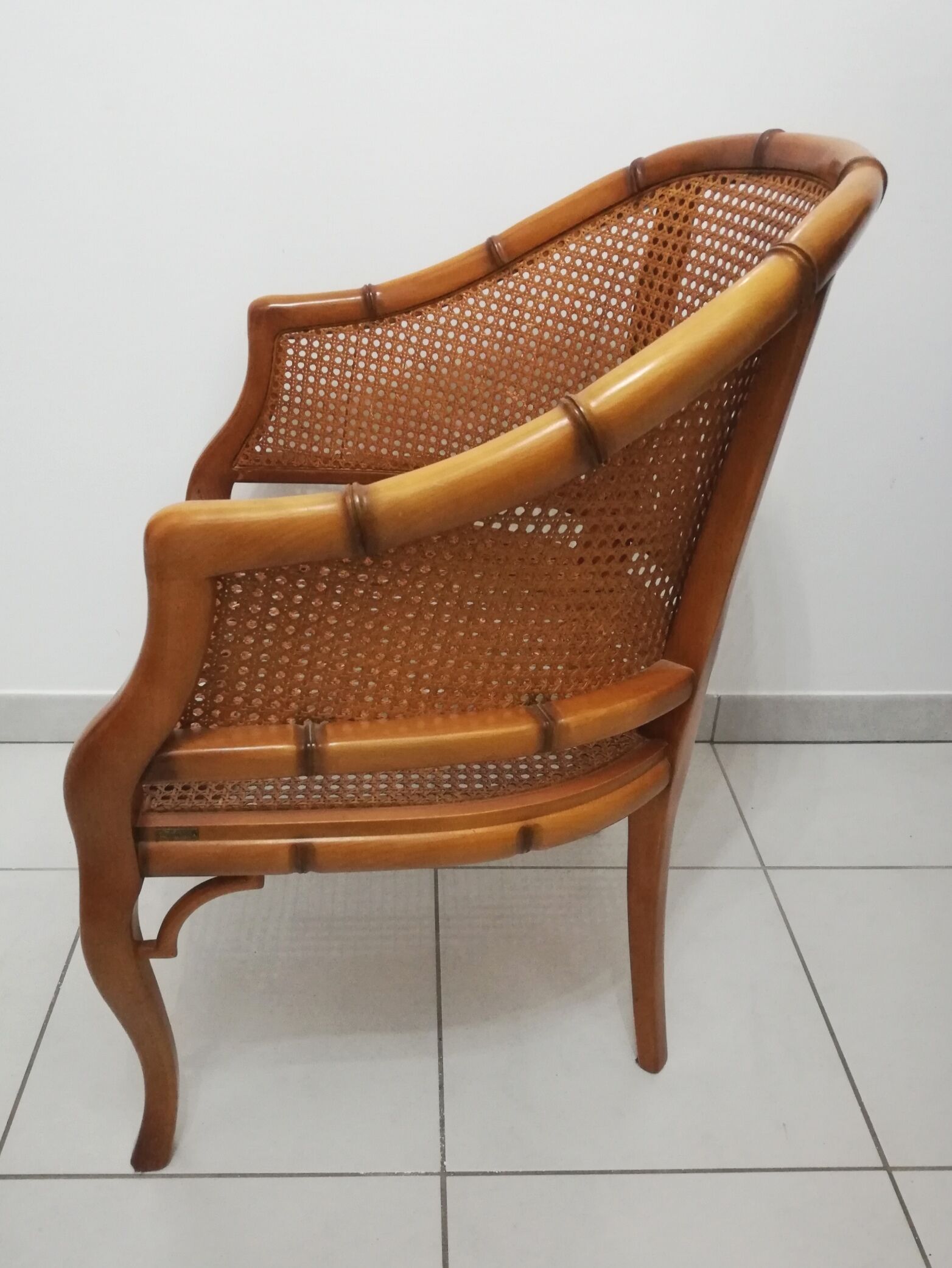 Fauteuil canné signé grange modèle faux bambou