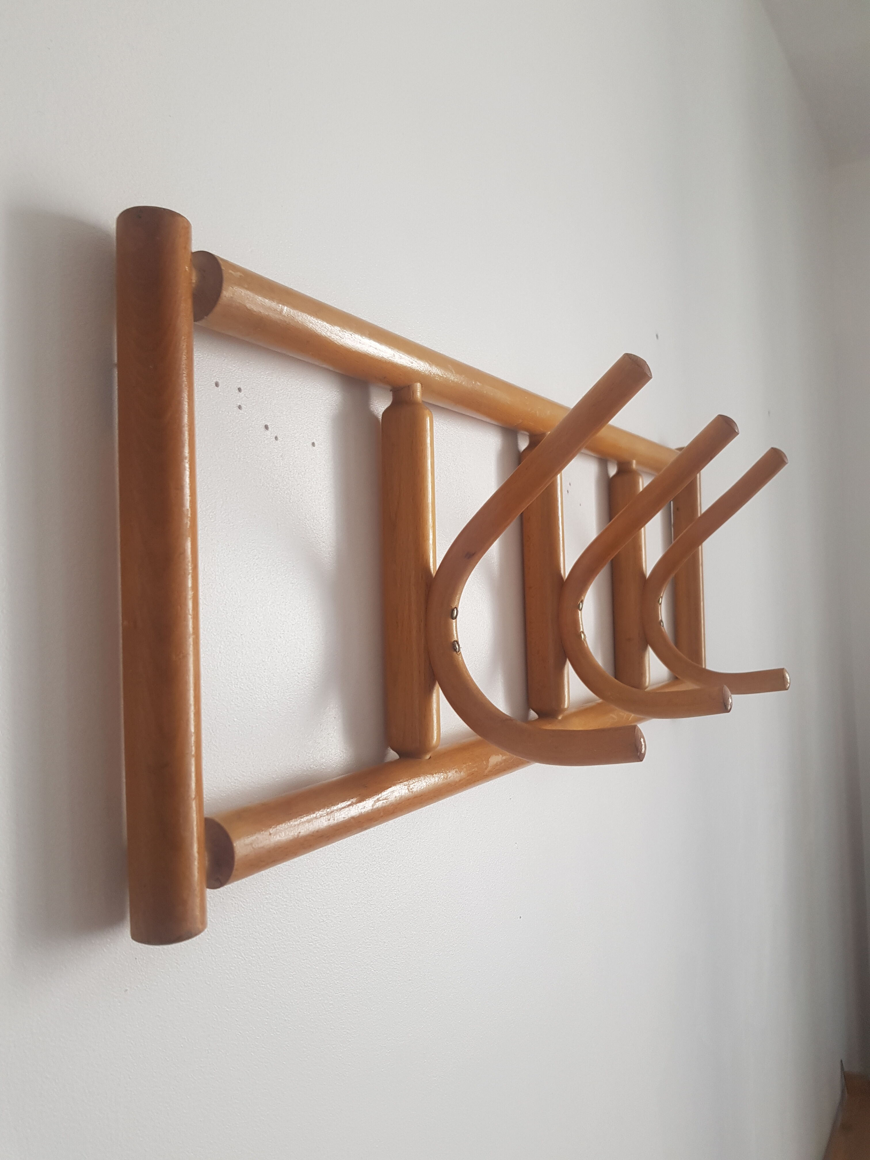Wooden wall coat rack