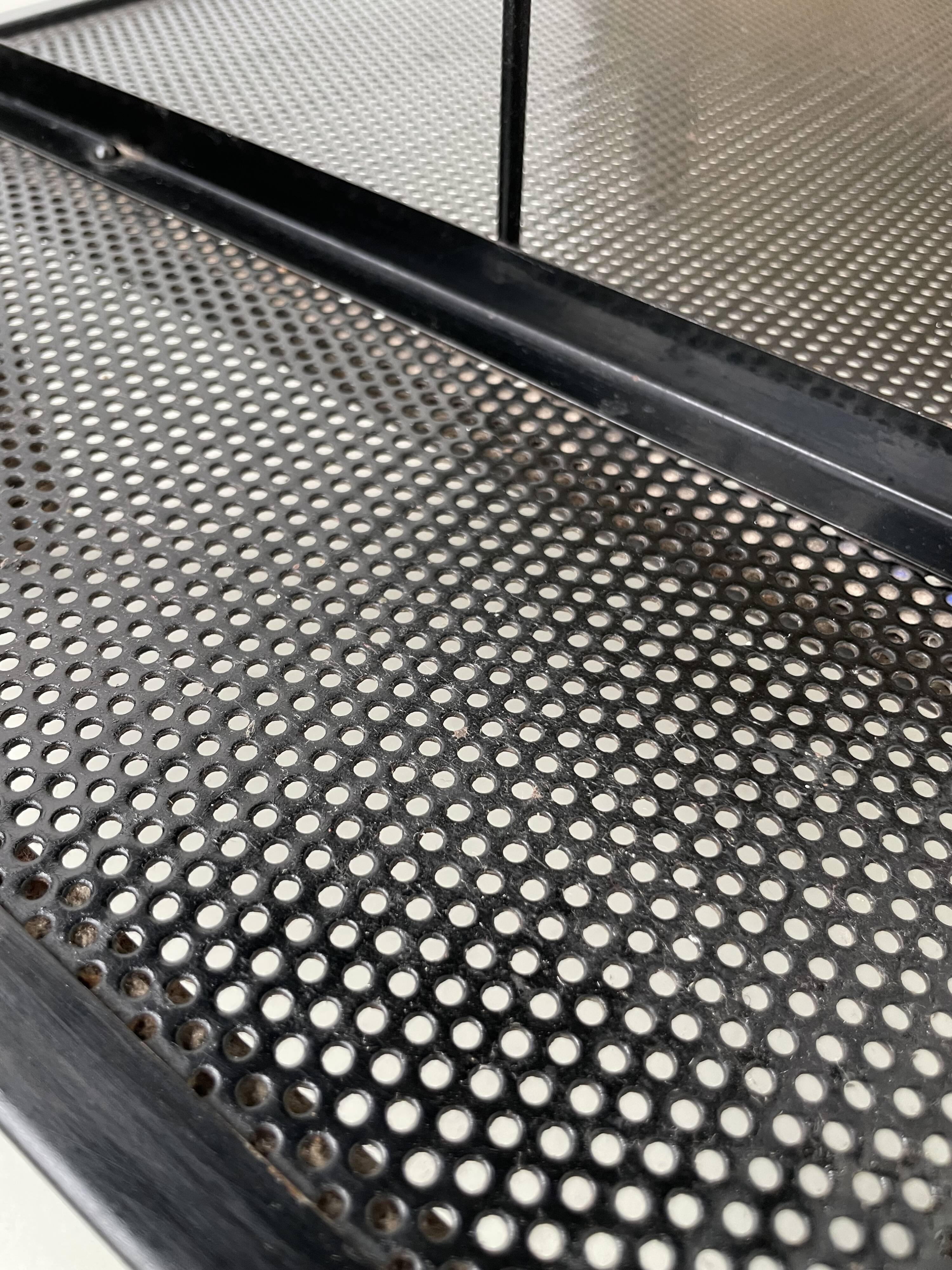 Perforated metal serving trolley in the Mathieu Matégot style