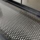 Perforated metal serving trolley in the Mathieu Matégot style