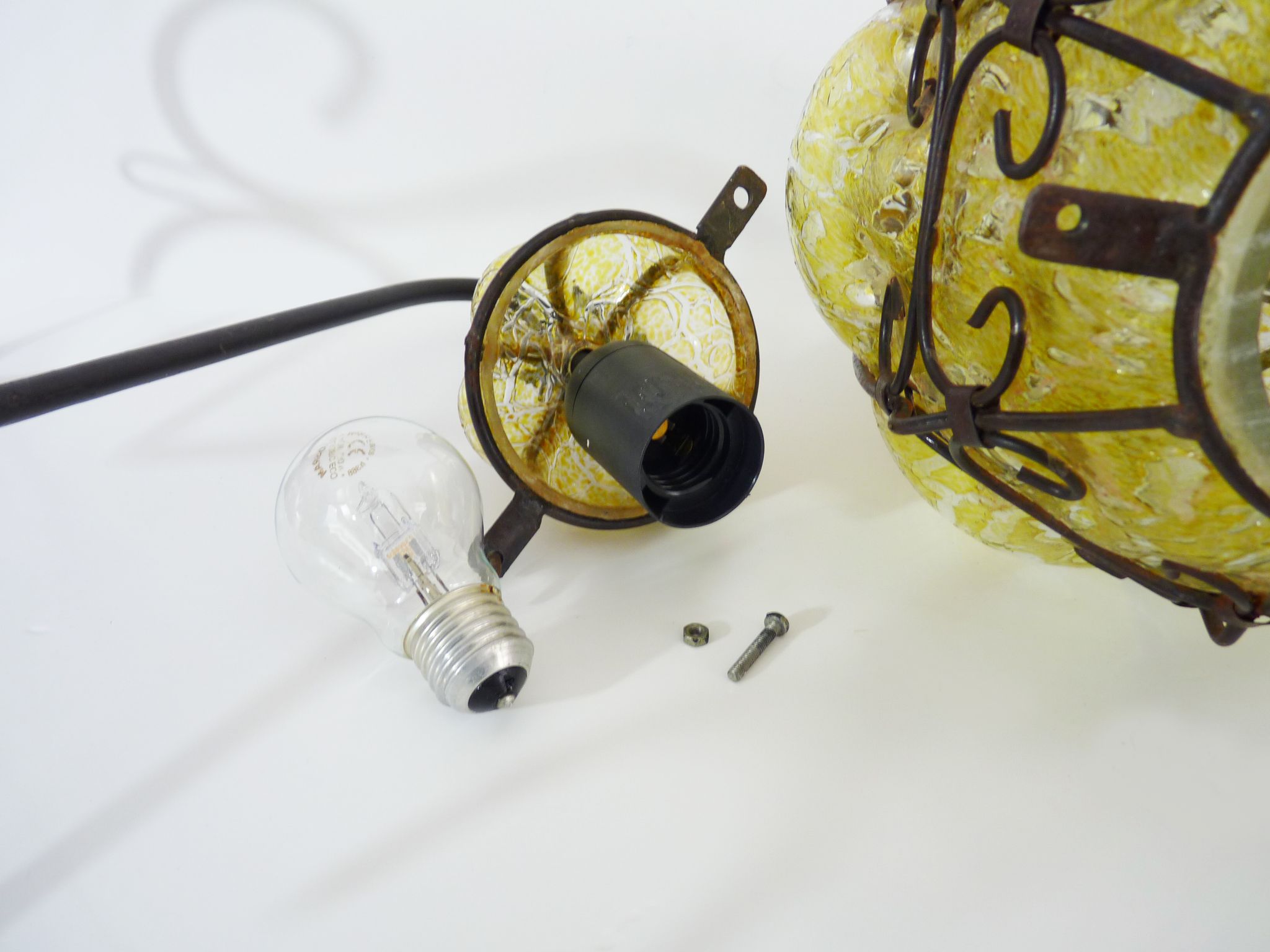 Italian vintage wall lamp in yellow blown glass and wrought iron. Year 70 80
