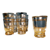 Set of 9 old glasses with golden net