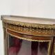 Napoleon III style curved display case in mahogany and veneer, 20th century