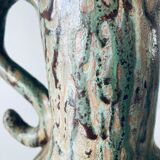 Old pitcher in glazed terracotta