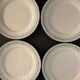 8 flat plates in opaque porcelain from Gien Terre de Fer, model Lauriers, XXth