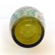 Enamelled green glass vase