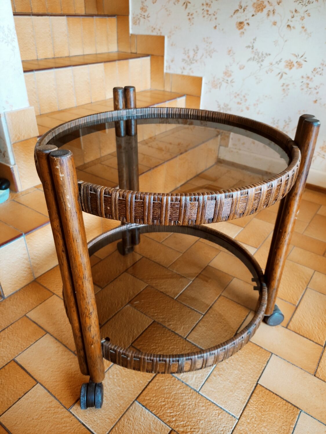 Round rattan bar table on wheels