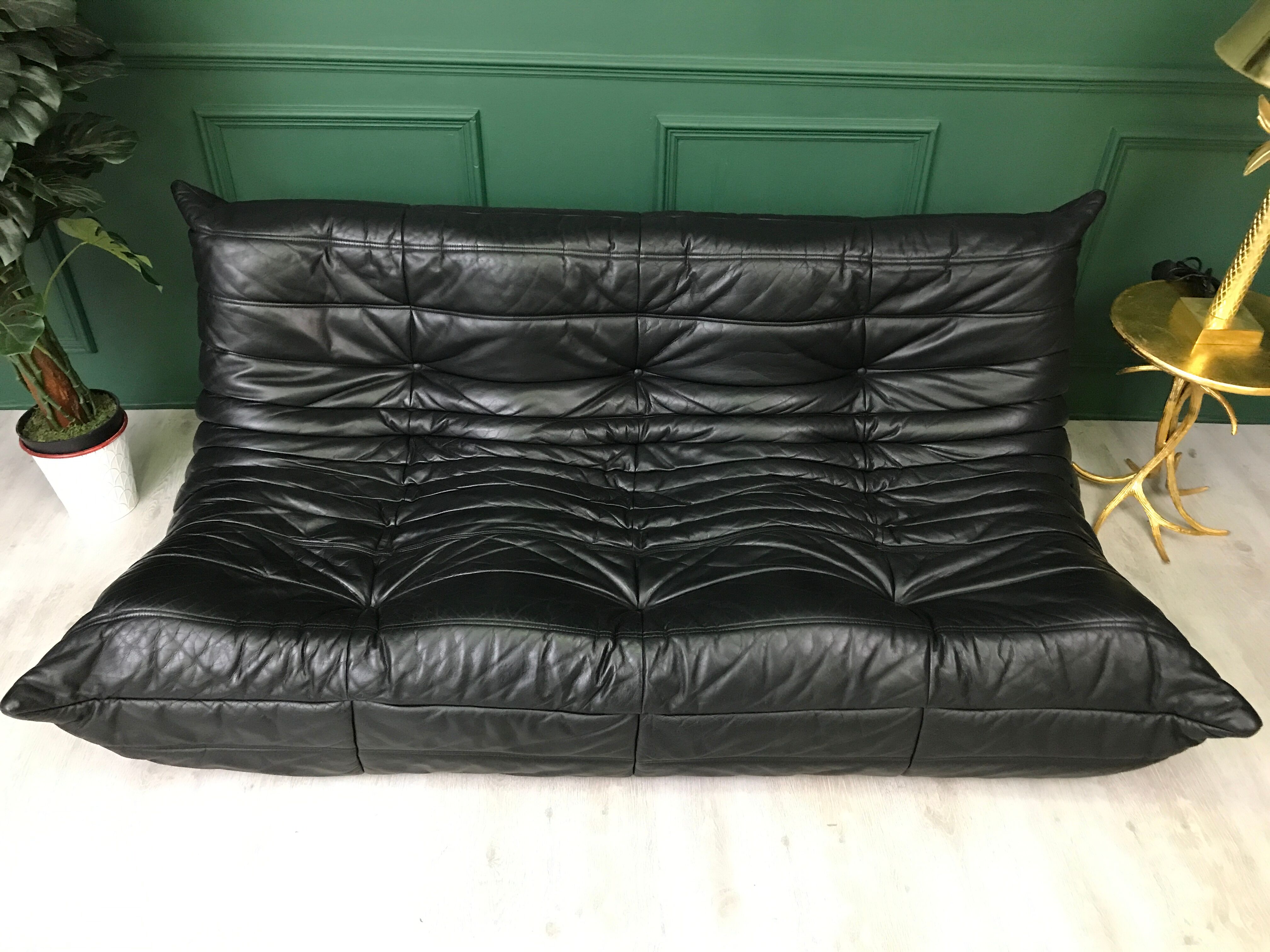 Black leather three seater sofa Togo by Ligne Roset