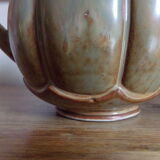 Pitcher in sandstone