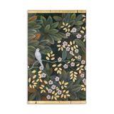 Painted canvas depicting a bird in a floral setting. Contemporary.
