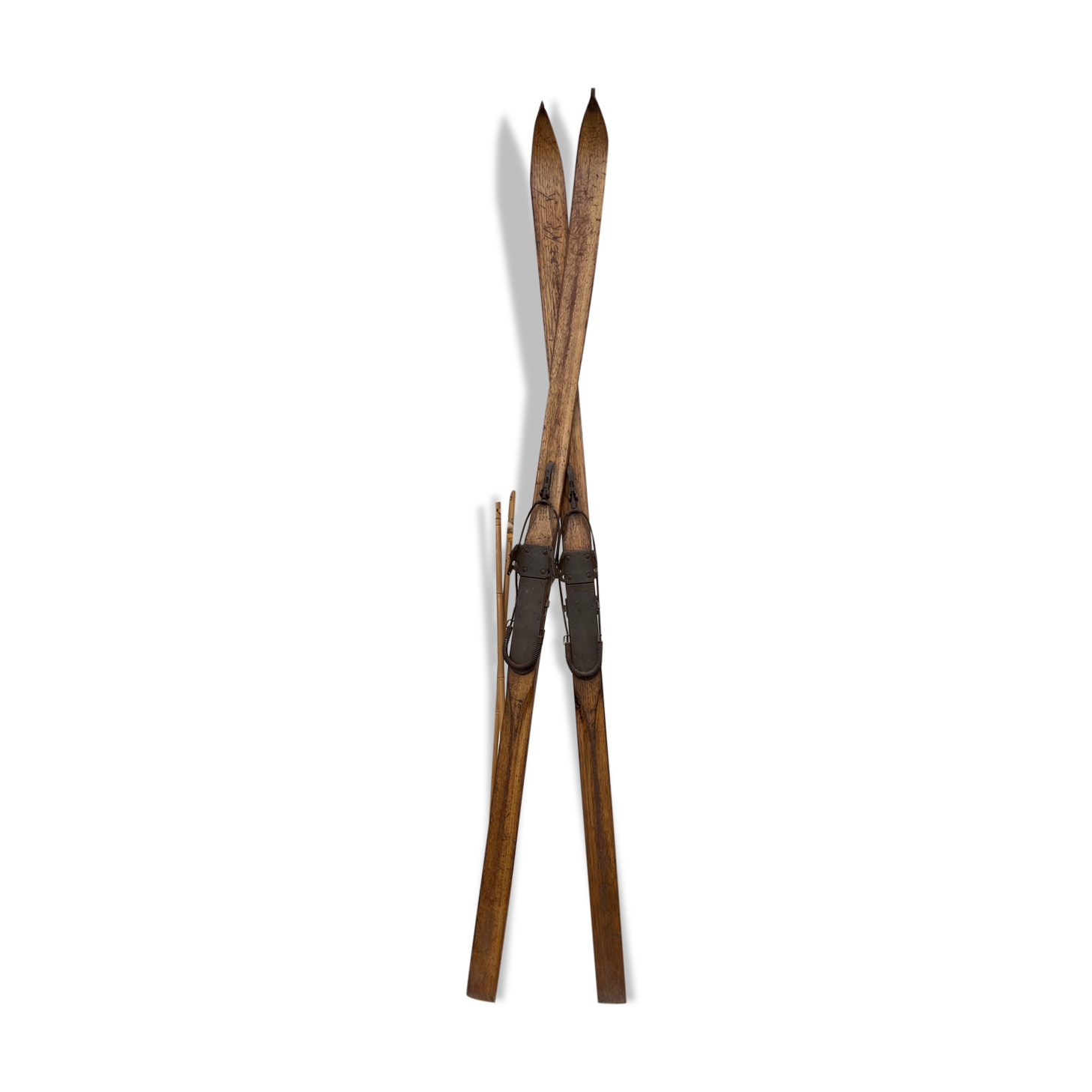 Wooden ski and its sticks