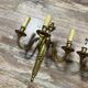 Pair of Louis XVI style gilt bronze wall lights with two light arms, 20th century
