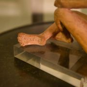 Terracotta sculpture of a seated woman by Norbert Treca contemporary art.