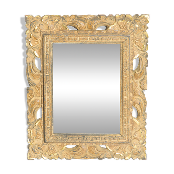 Decorative gold mirror mid-century in a wooden frame, Italy, 1960s.