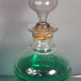 Old bottle of 19th century blown glass