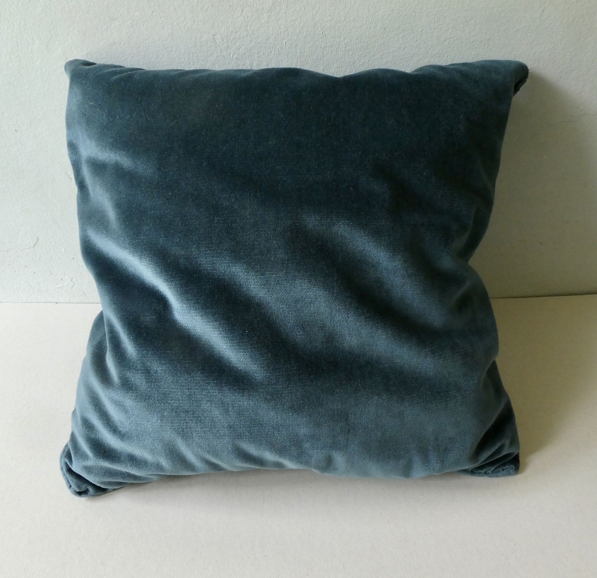 Pair of old cushions, in duck blue velvet, pleated effect