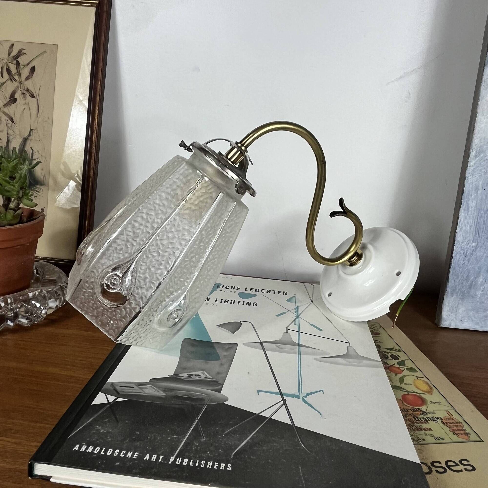 Vintage brass wall light with Art Nouveau tulip shade.