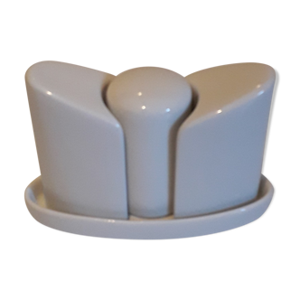 Set salt shaker, pepper tree and covered ceramic pot on small tray