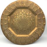 Oriental brass tray with chiseled decoration of arabesques and flowers