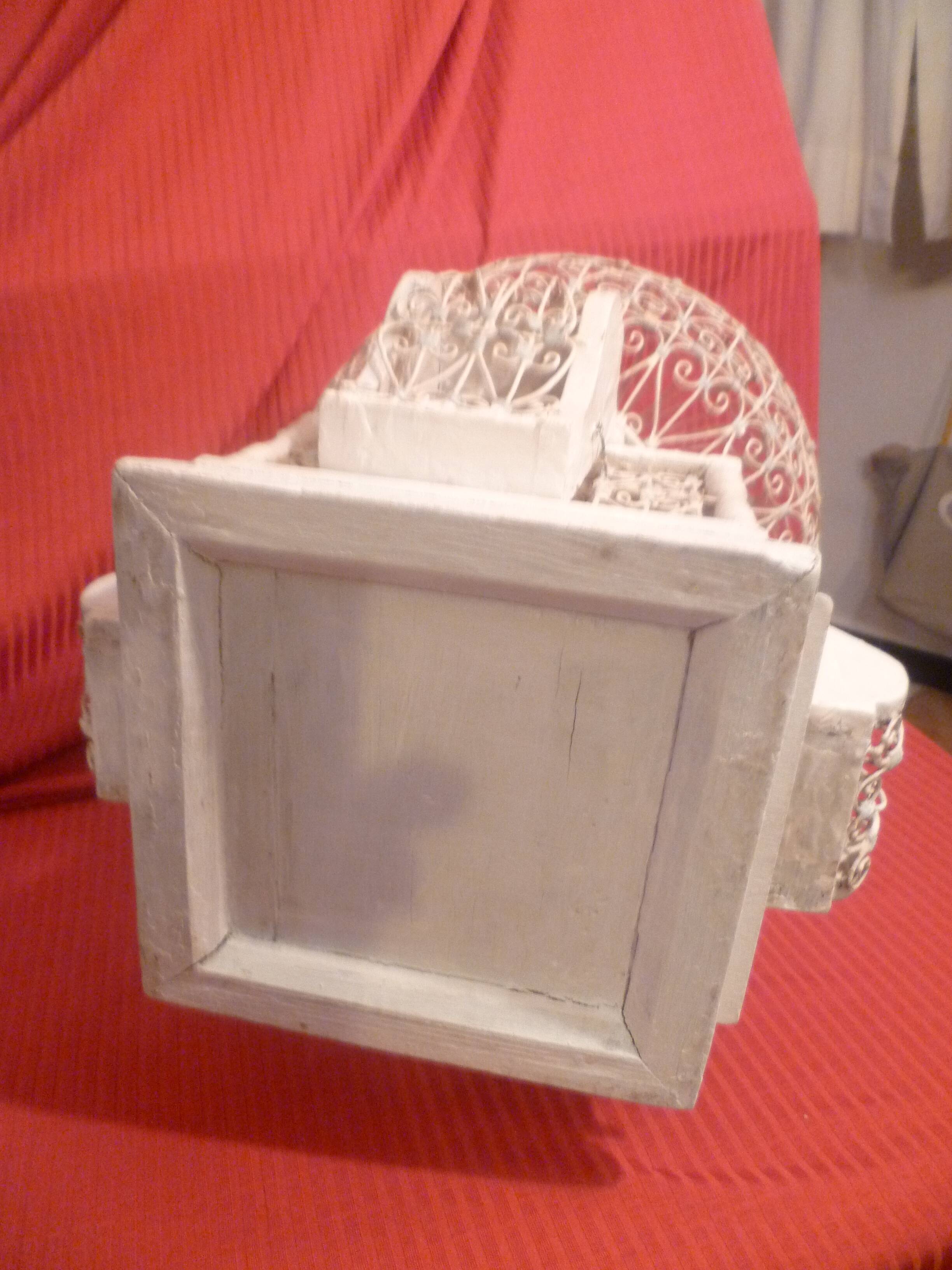 Antique handmade birdcage in metal and wood