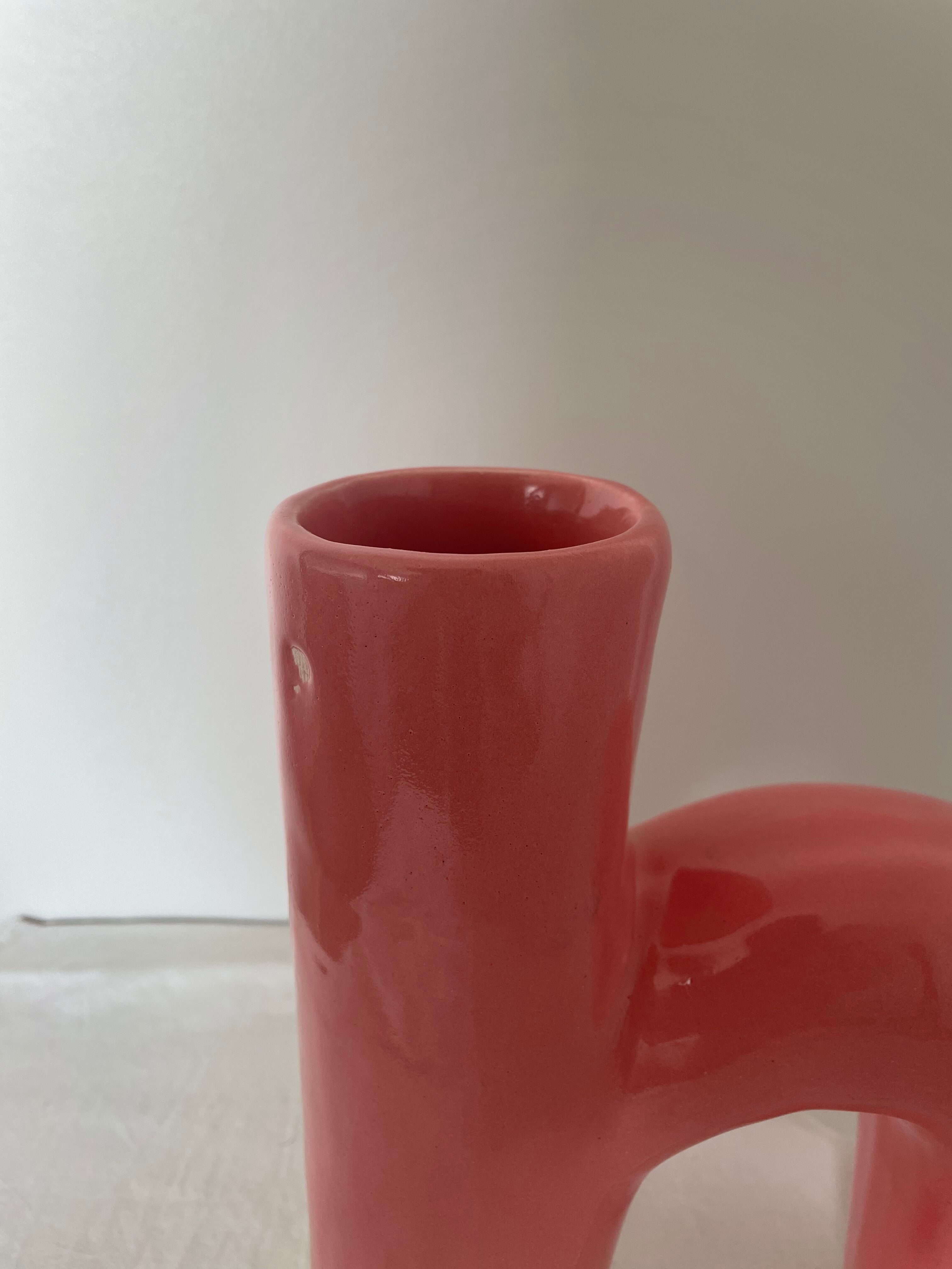 Abstract vase in arched pink ceramic