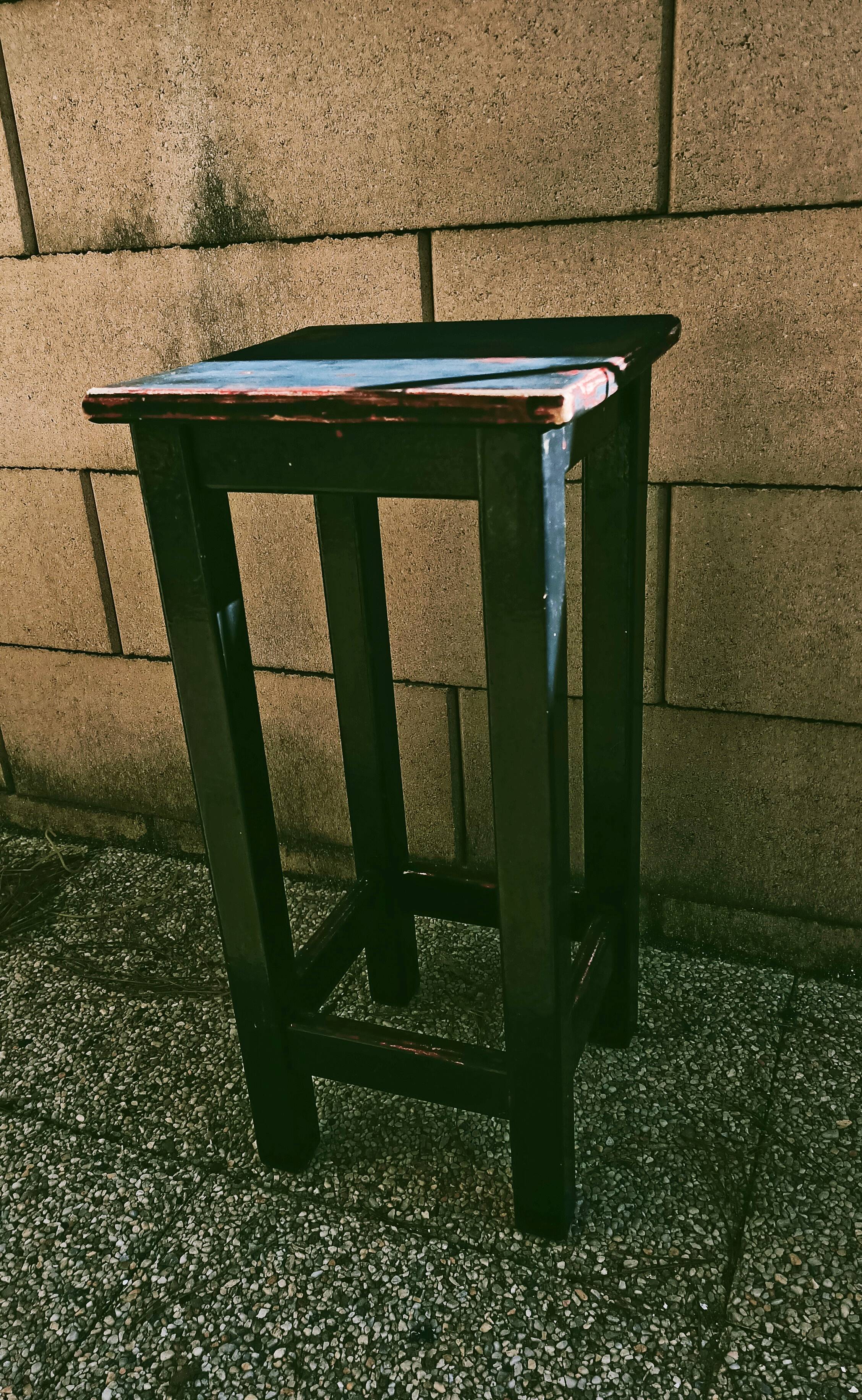 High patinated wooden stool