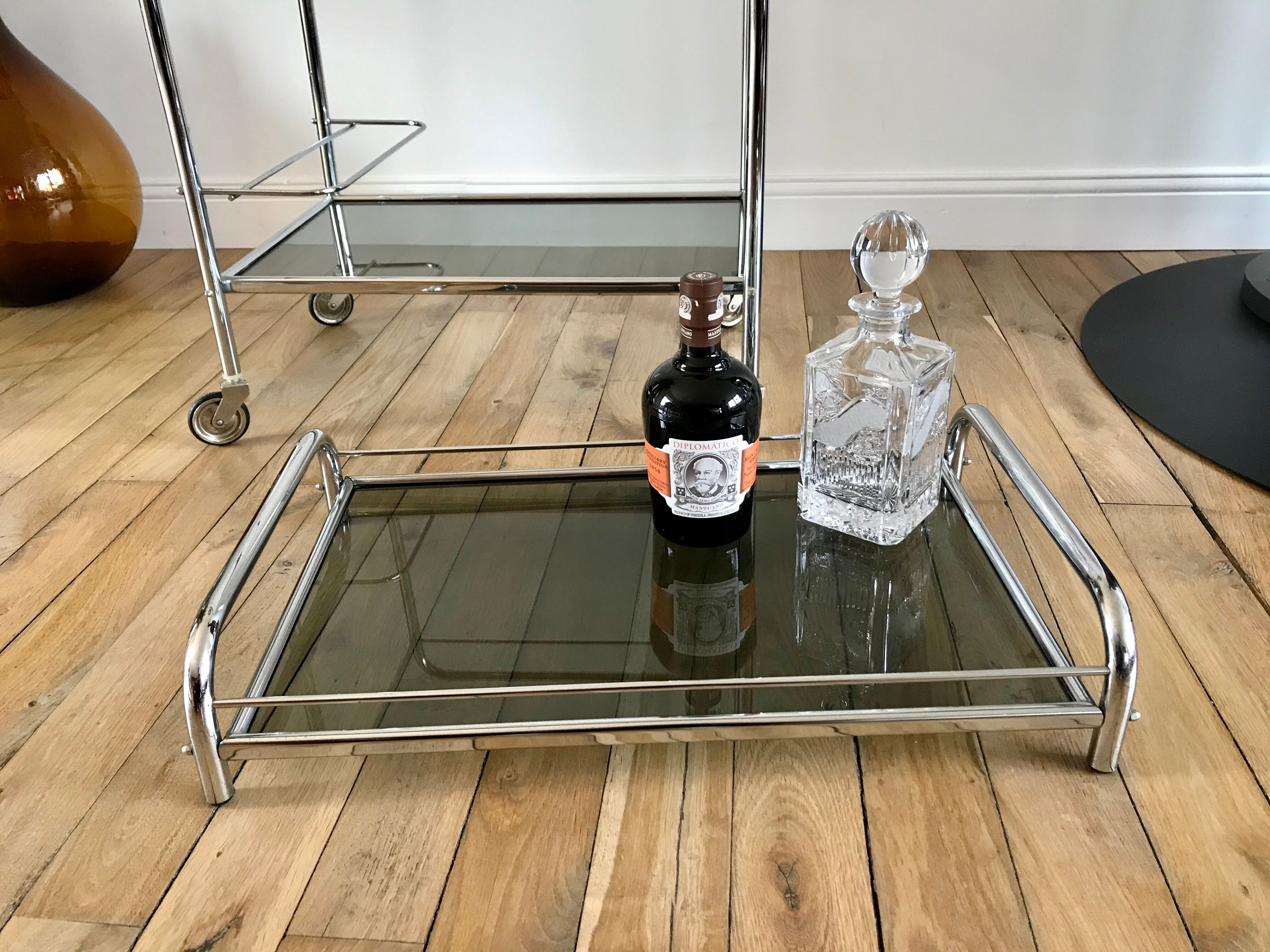 Serving in chrome steel and smoked glass 70s
