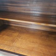 Mid-century mahogany buffet with teal glass and compartments with a drawer.