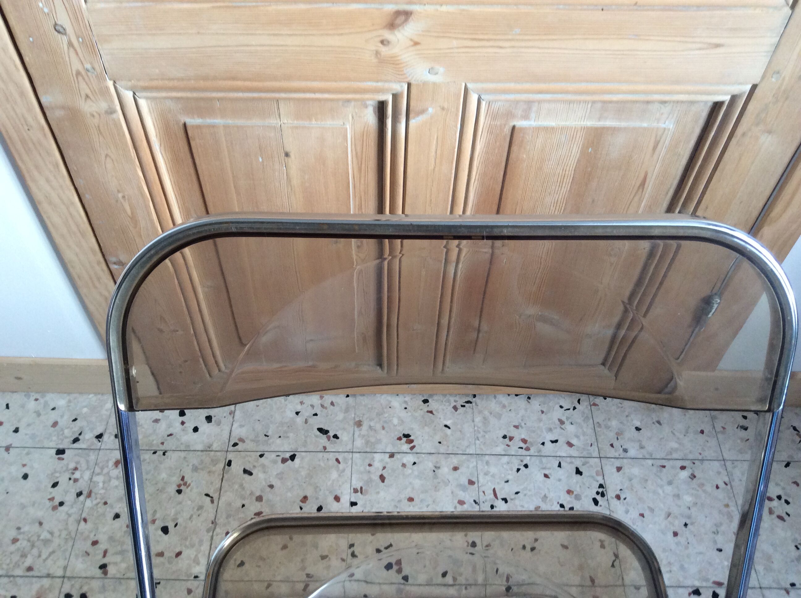 Folded chair by Giancardo Piretti for Castelli