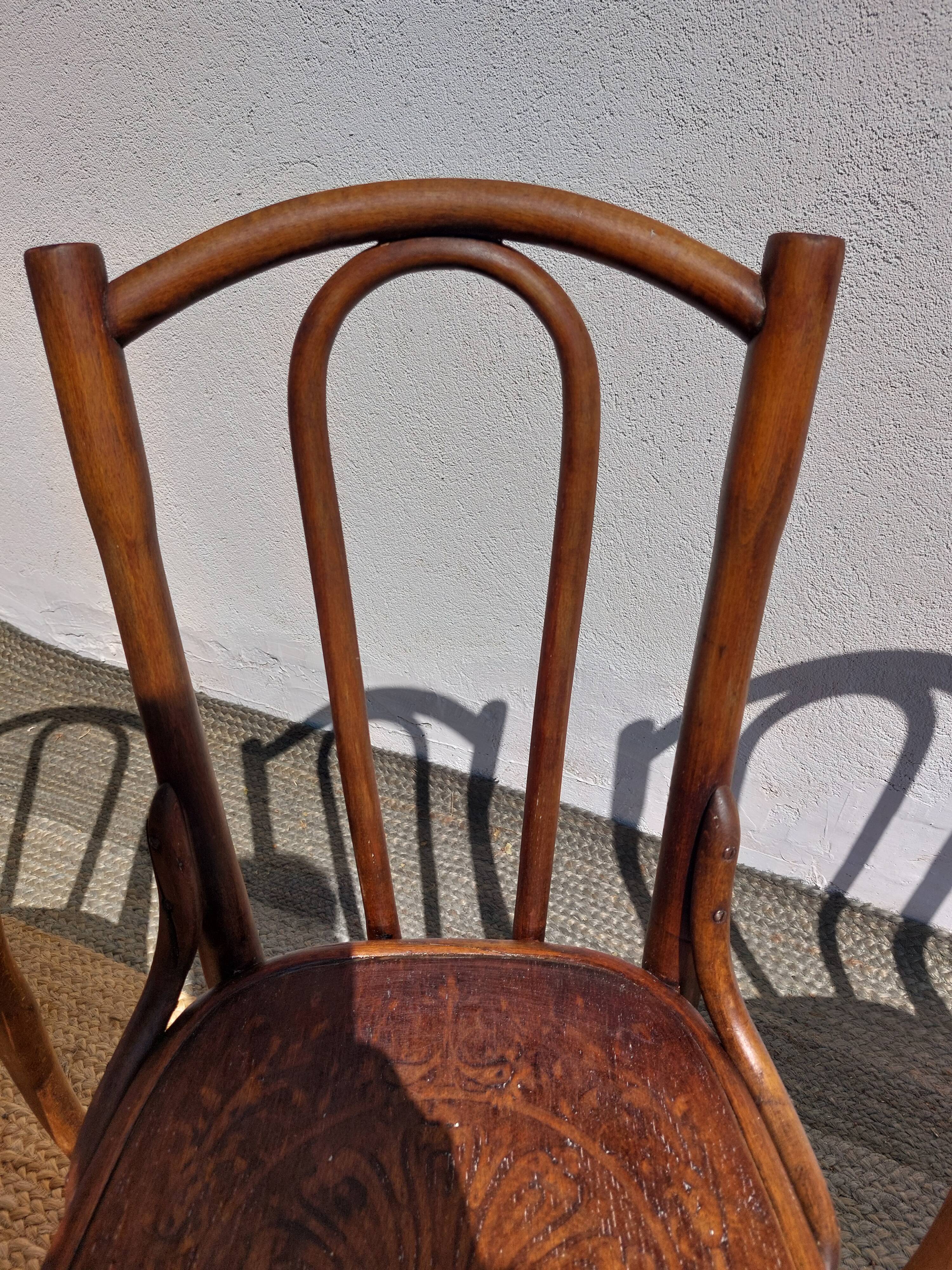 set of 3 curved wooden bistro chairs with patterns