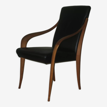 Black leather and cherrywood lounge chair with curved arms