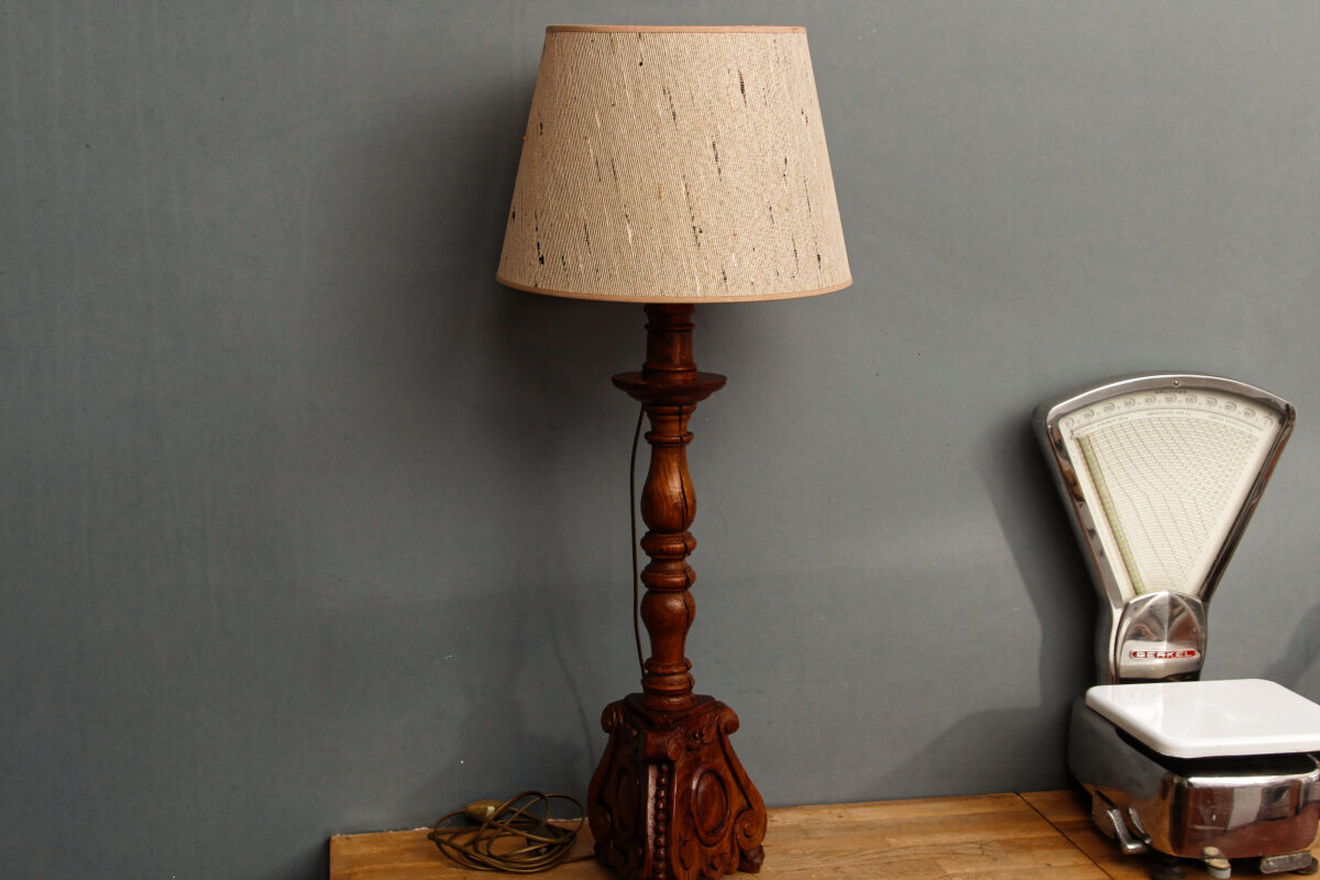 Carved wooden lamp, fiber shade