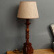 Carved wooden lamp, fiber shade