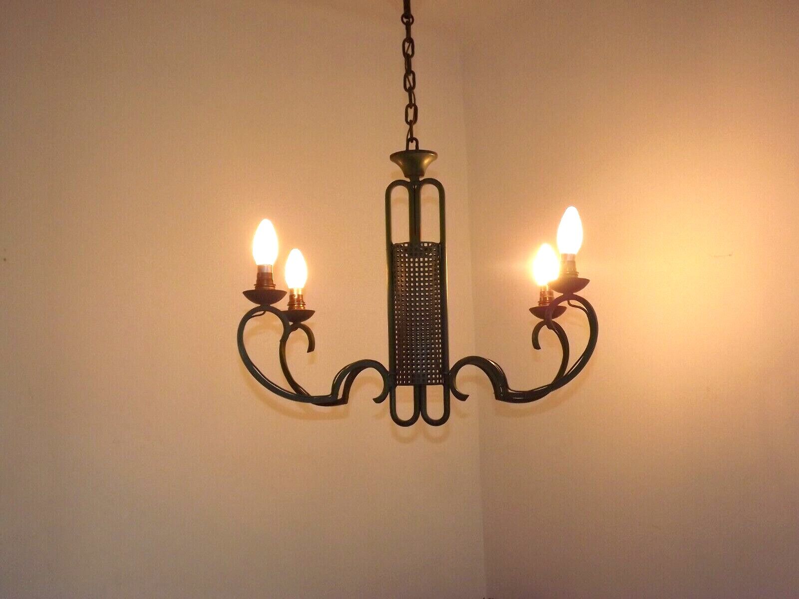 Green iron 4 light chandelier with scrolled arms