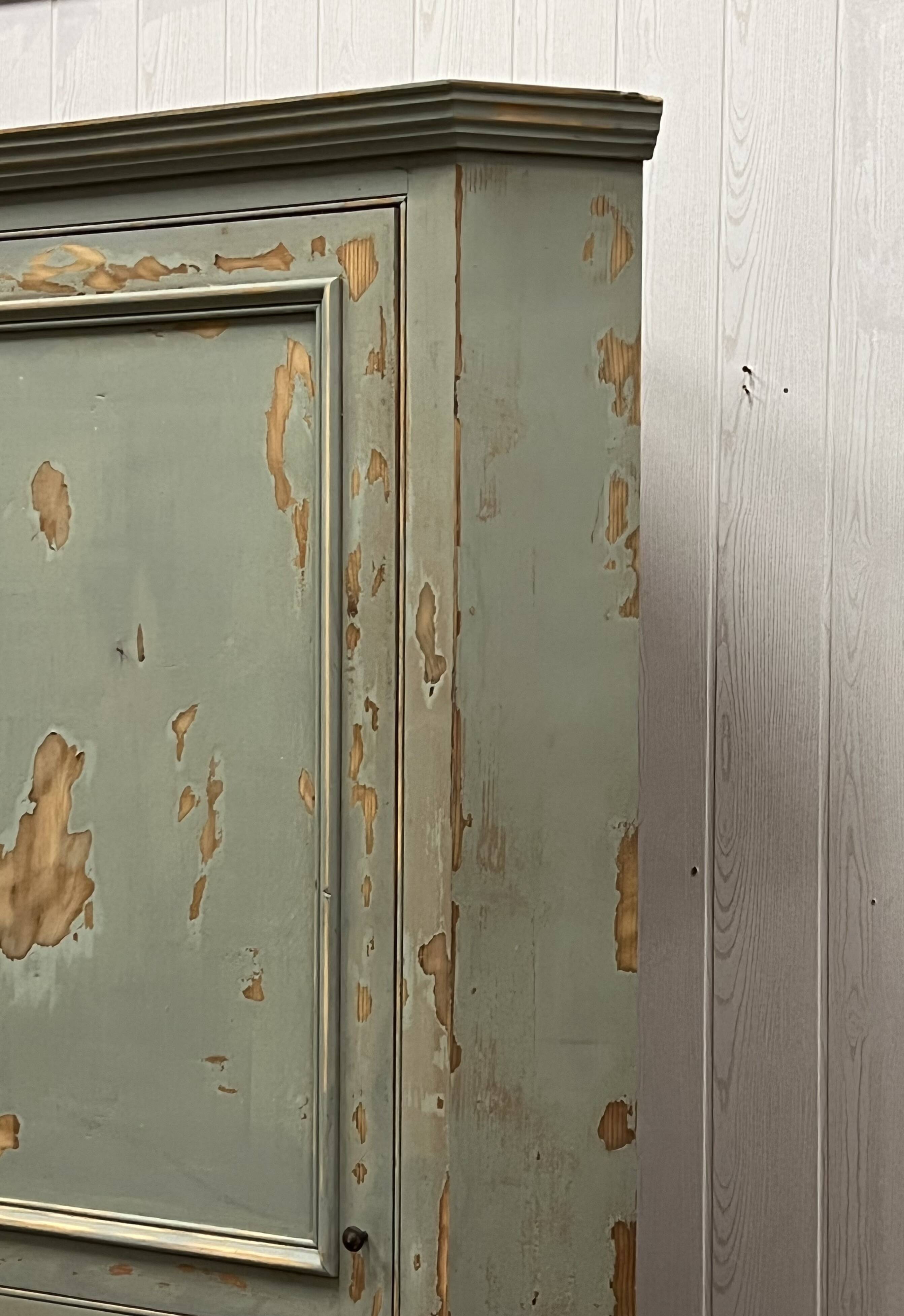 Patinated corner cupboard