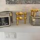 Series of 3 gold Nagel modular candlesticks