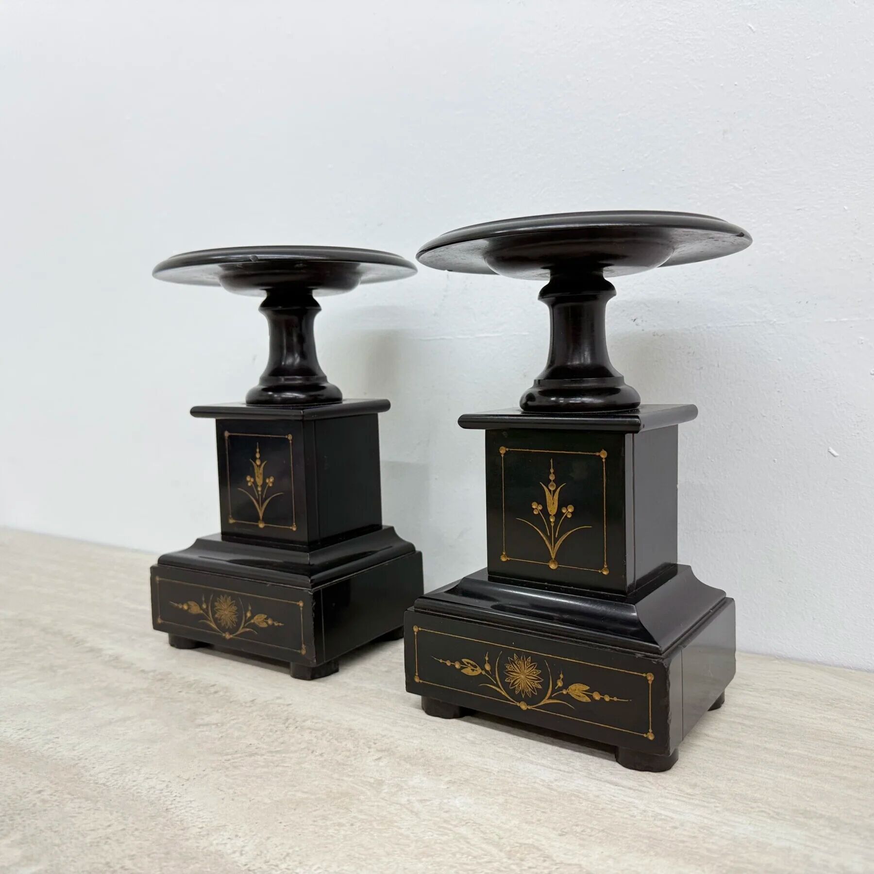 Antique French black marble cassoulets gilt decor pedestals neoclassical pair, 1900s