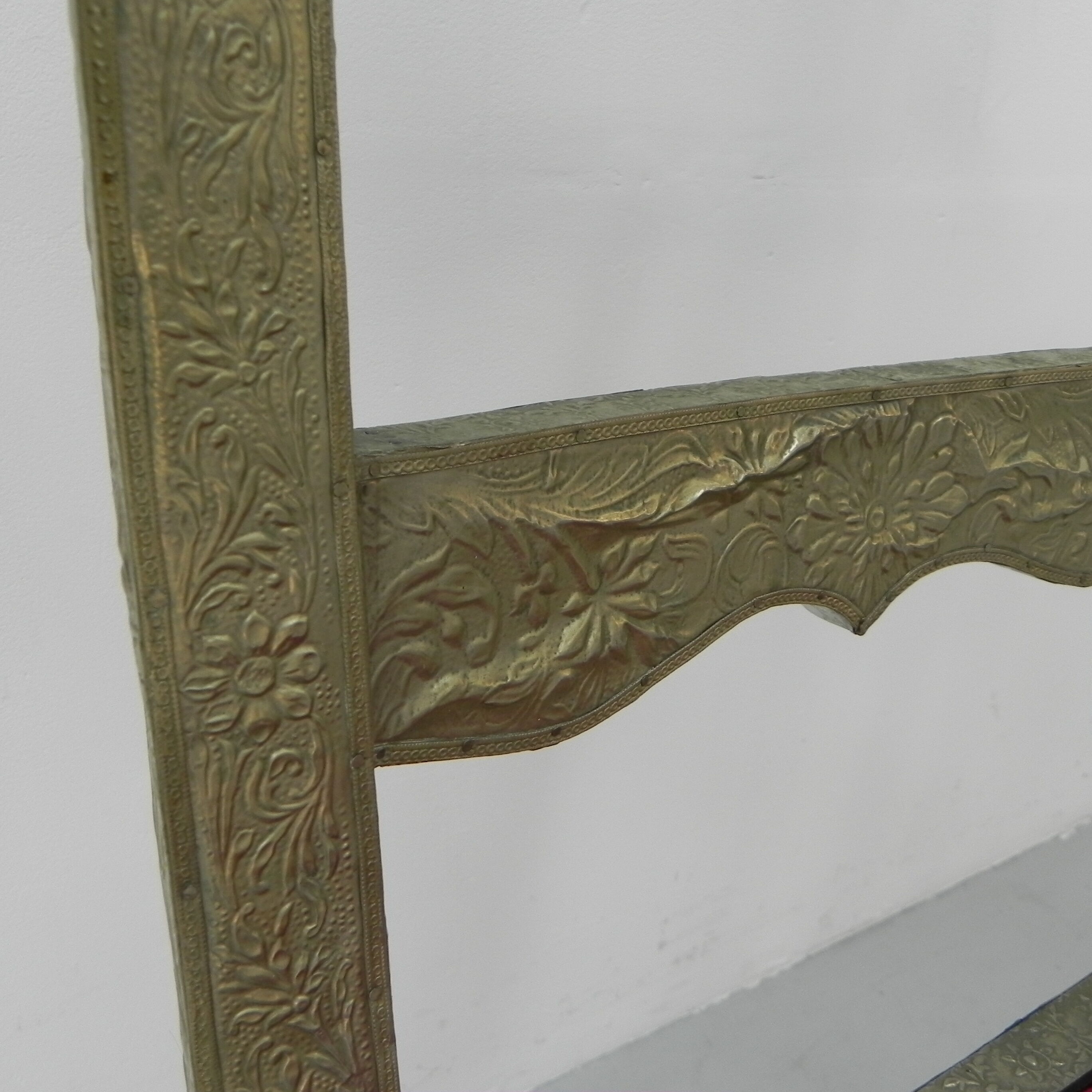 Dining chair upholstered with stamped tin