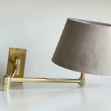 articulated brass and velvet wall light