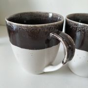 Set of three two-tone mugs, glazed stoneware, café workshop style.