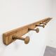 Wall-mounted coat rack with 12 hooks