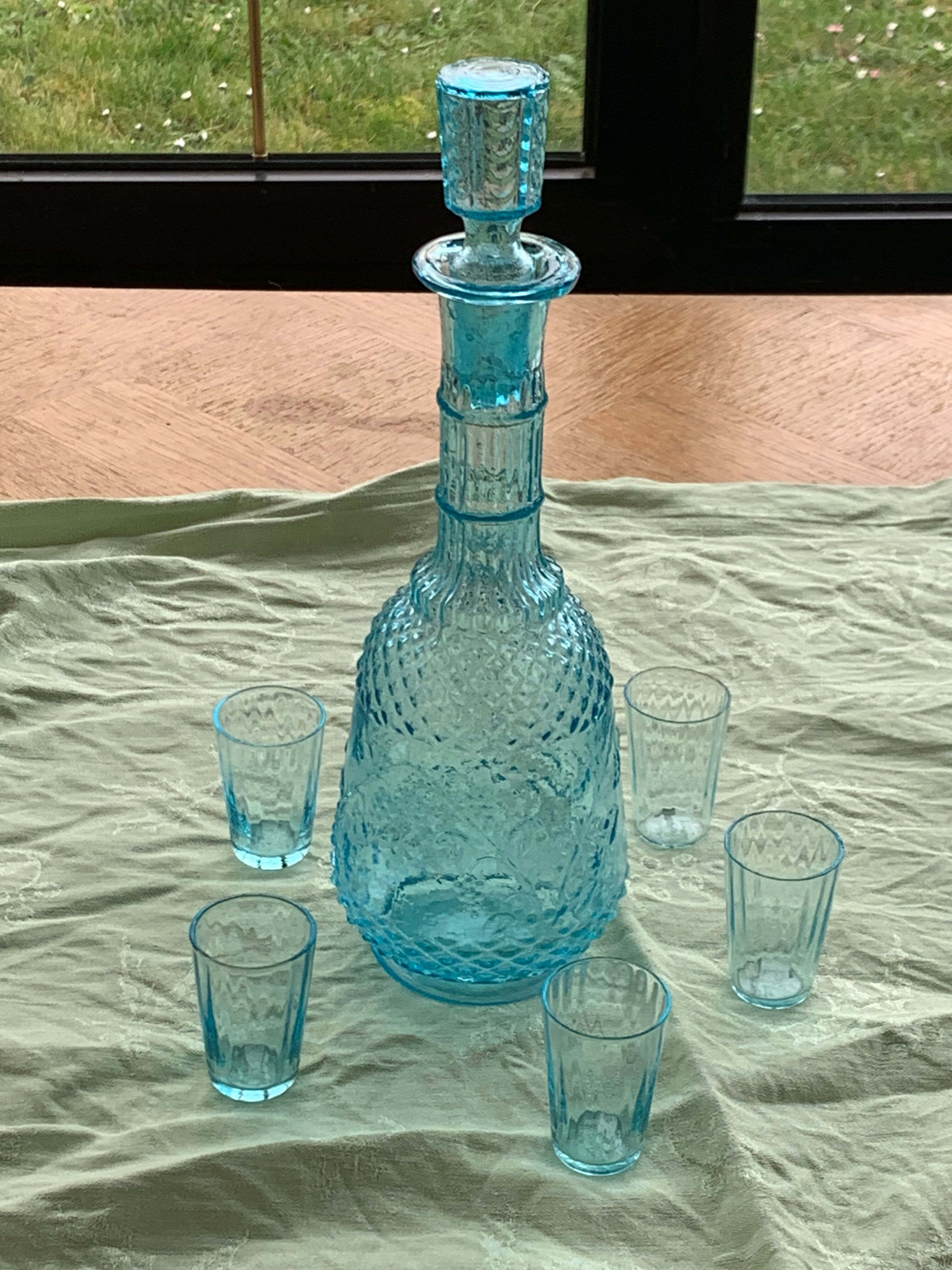Carafe and 5 old blue glass liqueur glasses
