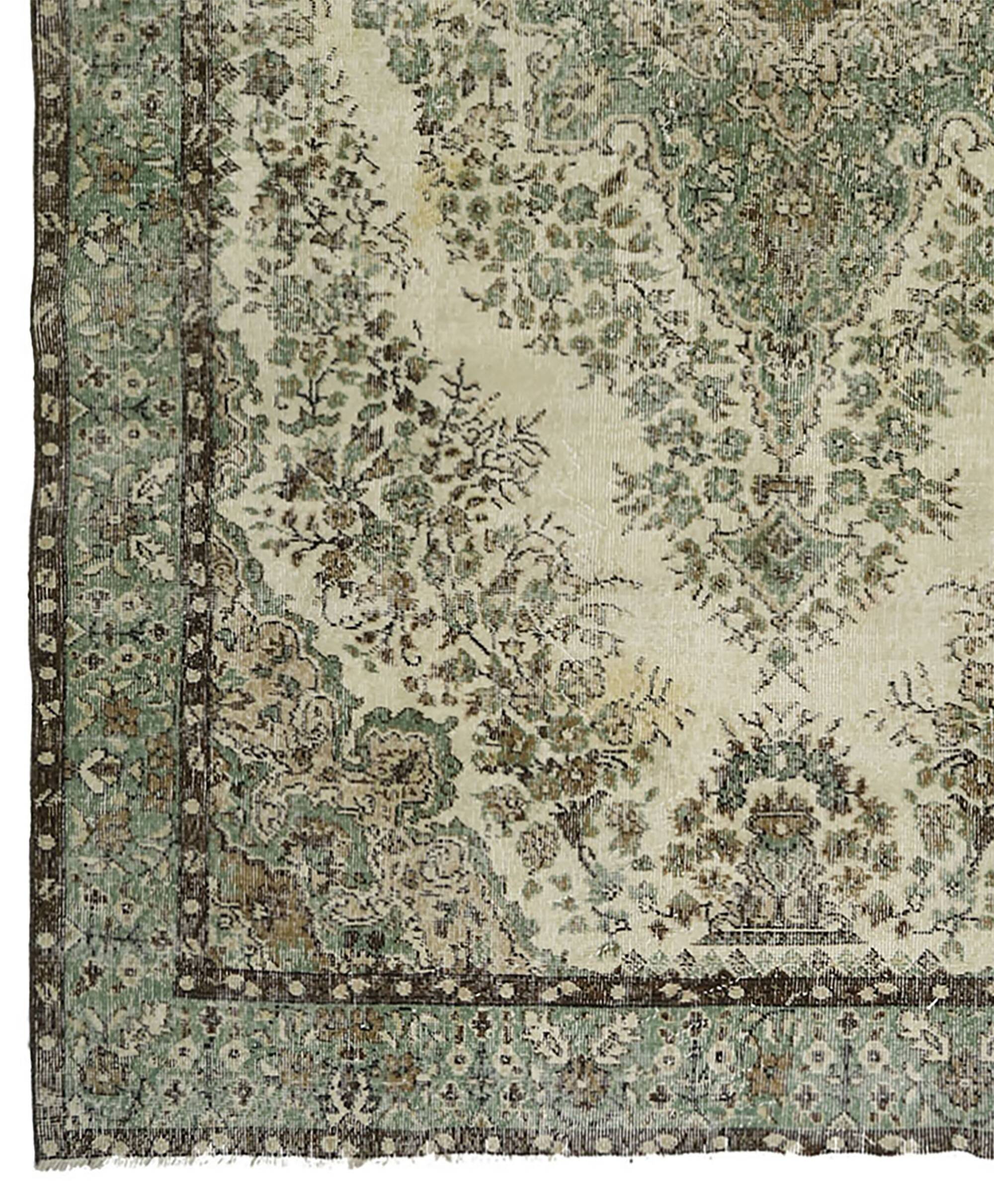 Vintage Oushak rug with green and beige medallion, 345 x 205 cm.