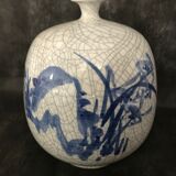 Vase boule à col pincé aplati