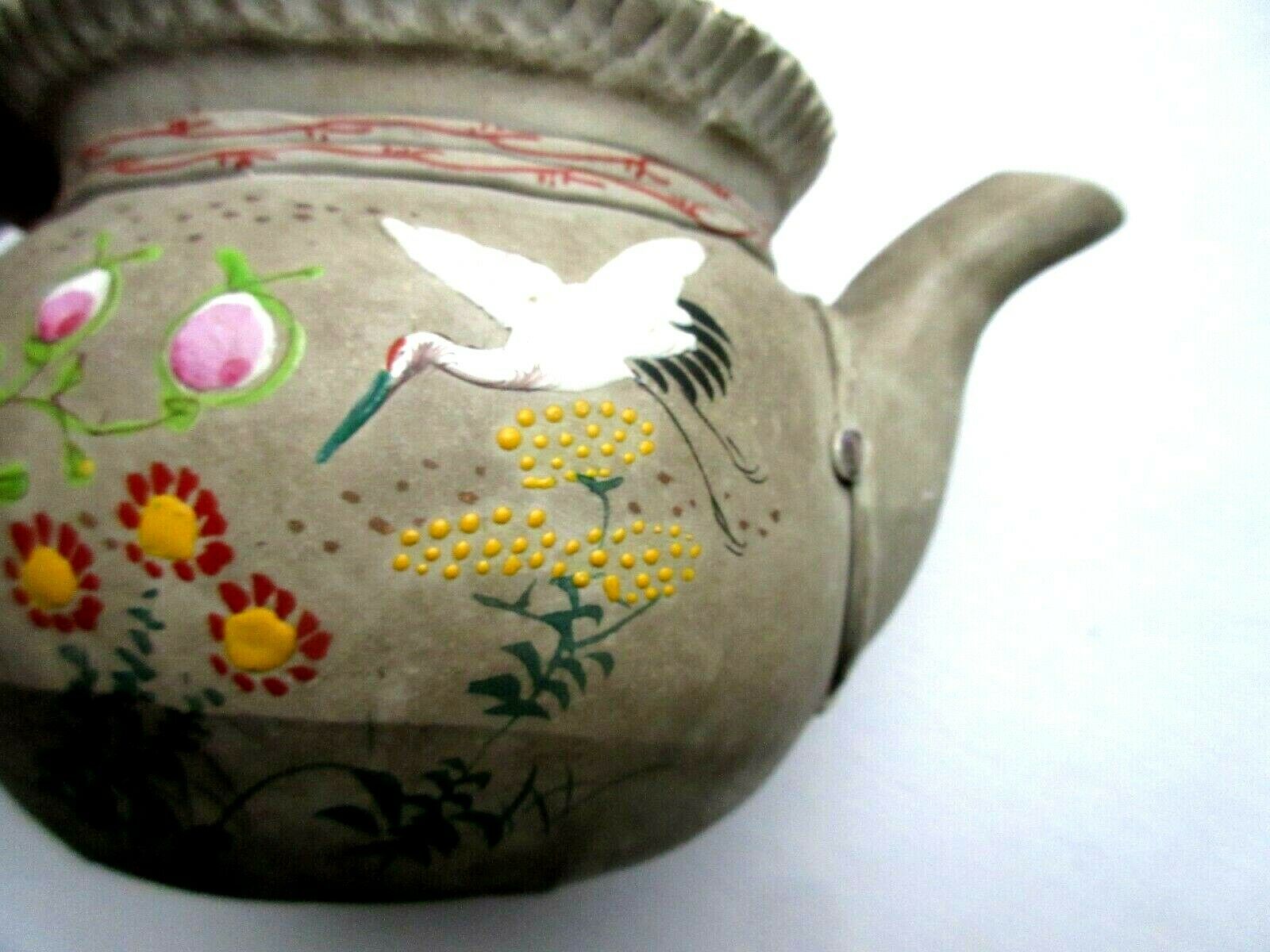 Japanese Art Deco teapot in porcelain biscuit enamelled with cranes and flowers